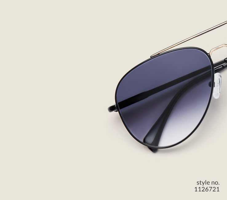 Image of Zenni black aviator style #1126721, shown with a gray gradient tint and 
                a light green background.