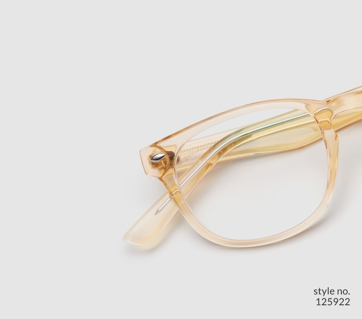 Image of Zenni yellow translucent oval glasses style #125922 shown with a light gray background.