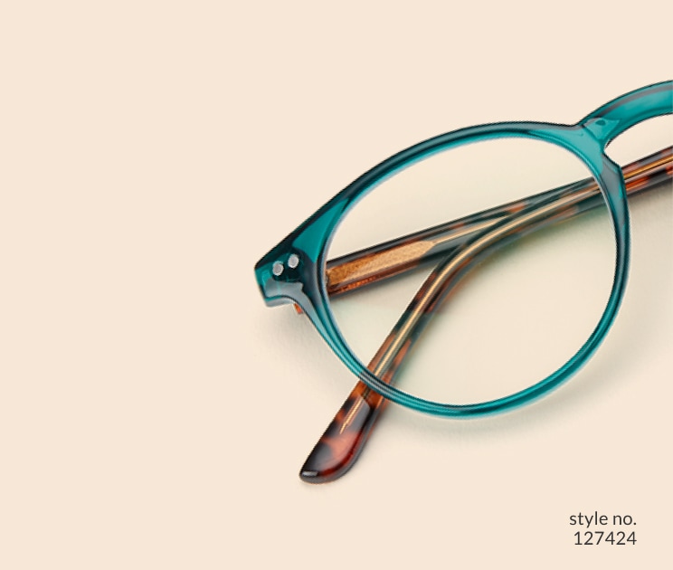 Image of Zenni green round glasses style #127424 shown with a light peach background.
