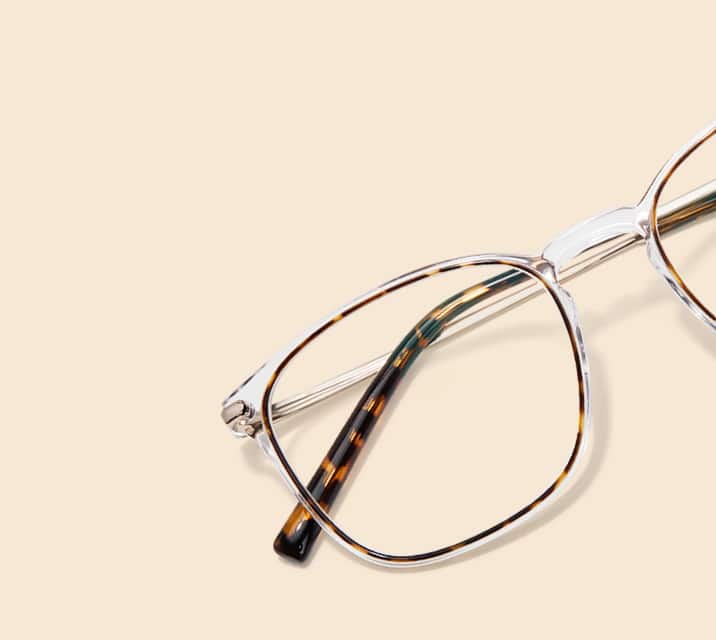 Image of Zenni clear square glasses style #7818725 shown with a beige background. 