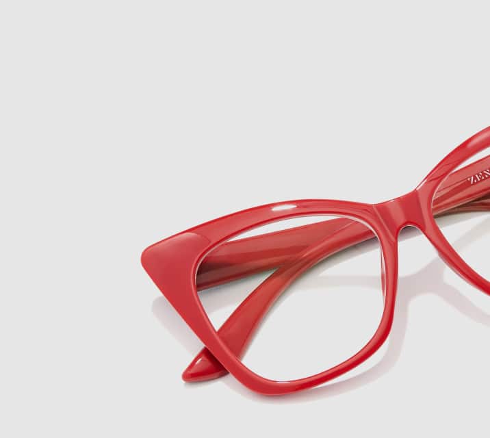 Image of Zenni red cat-eye glasses style #2027018 shown with a light gray background.