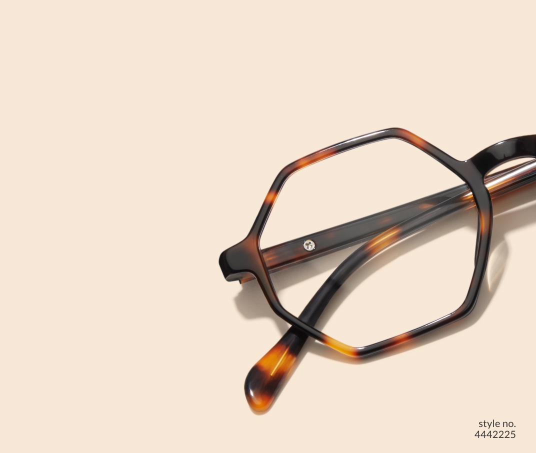 Image of Zenni geometric tortoiseshell glasses style #4442225 shown with a light peach background.