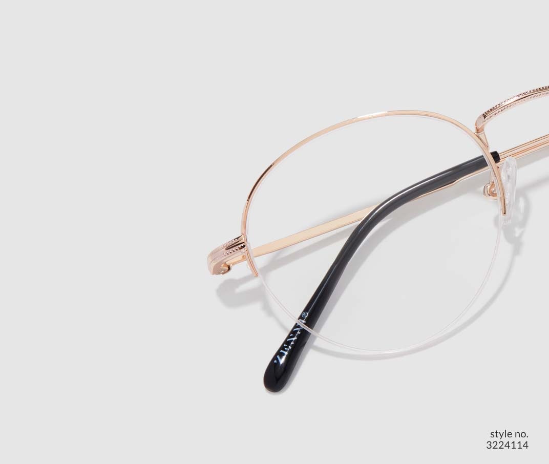 Image of Zenni gold browline glasses style #3224114 shown with a light gray background.