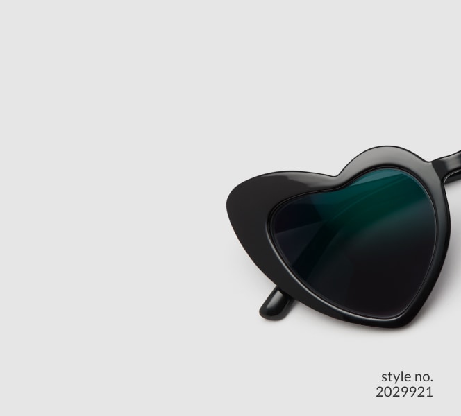 Image of Zenni heart-shaped frame #2029921, shown with a dark gray tint and a 
                light gray background.