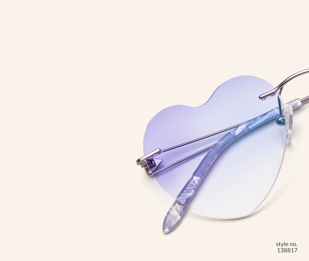 Image of Zenni rimless heart-shaped style #138817, shown with a lavender tint and 
                a beige background.