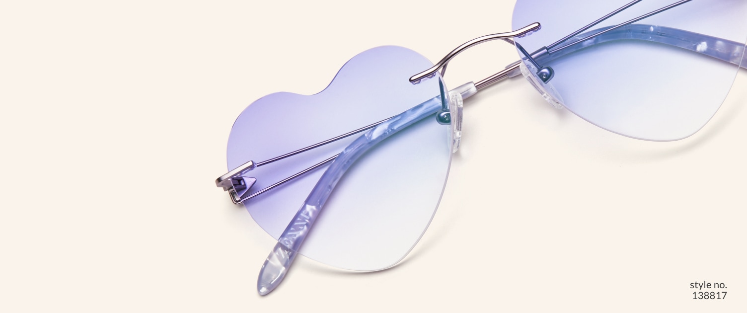 Image of Zenni rimless heart-shaped style #138817, shown with a lavender tint and 
                a beige background.