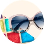 Zenni premium geometric sunglasses #113619 on a cream-colored background with colorful tiled accents.