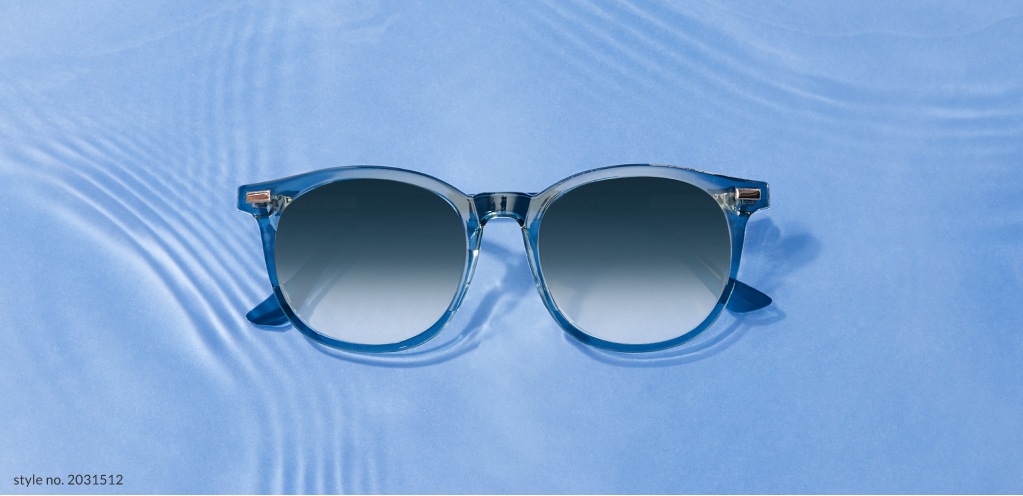 Image of Zenni square glasses #2031512 with gradient gray tinted lenses, against a rippled water background.