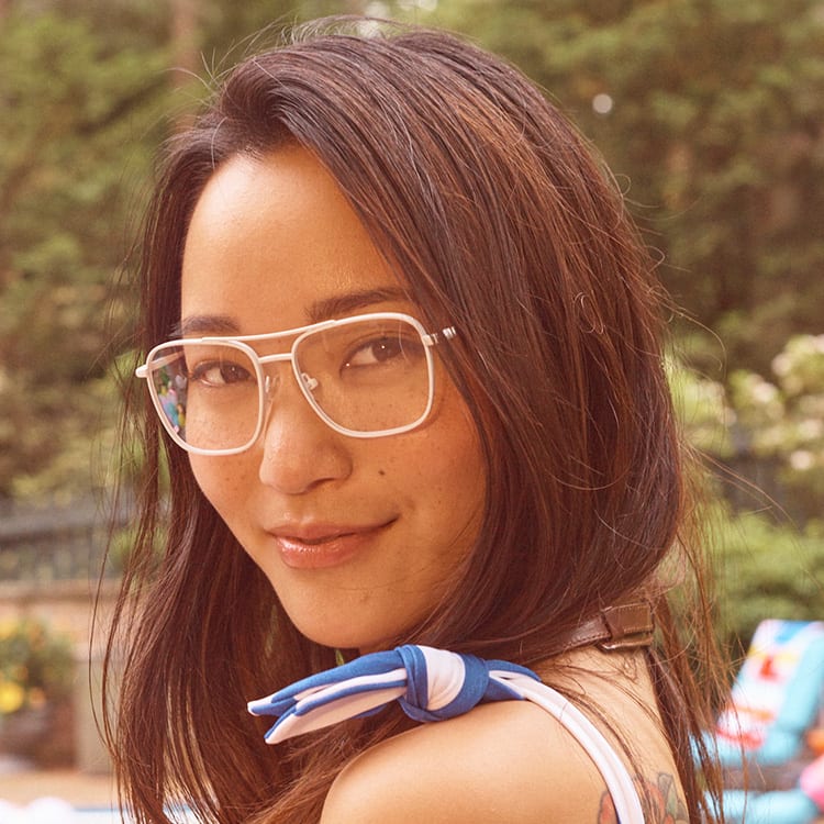 A girl enjoying the free time wearing timox zenni glasses