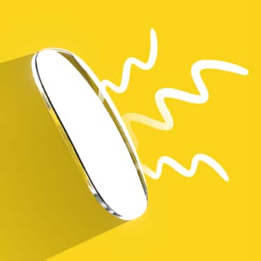 A clear Trivex lens on a yellow background, with illustrated wiggle lines on side and shadow on the other to indicate UV filtration.