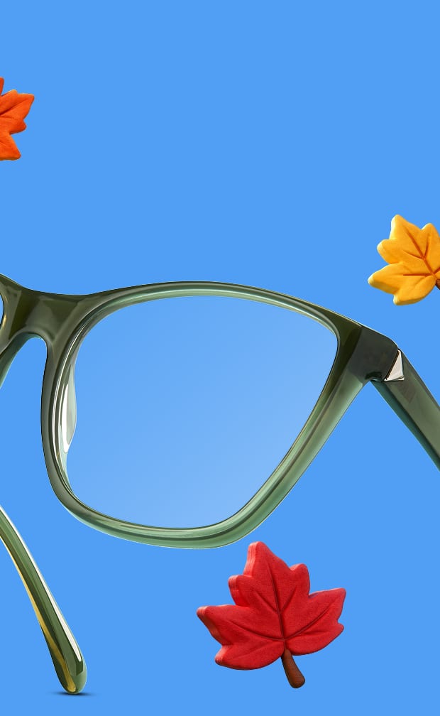 Gros plan sur un style carré olive translucide Zenni sur fond bleu avec des feuilles d'automne colorées.