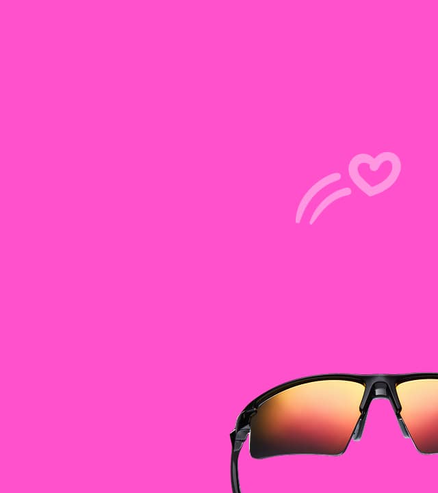 A pair of mirrored sports sunglasses floats near the bottom of a bright pink background with a heart-shaped accent above.