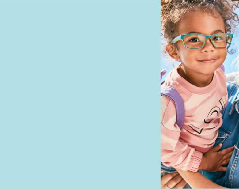 Smiling family with toddler wearing blue and yellow rectangle glasses, mom with purple and blue patterned glasses, dad with transparent glasses, and child with black rectangle glasses.