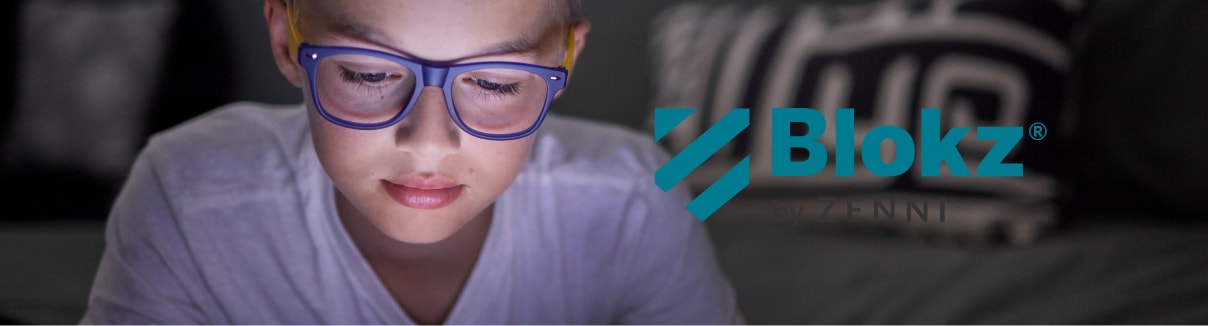 Blokz. Image of a kid wearing Zenni blue square glasses looking down to a monitor 