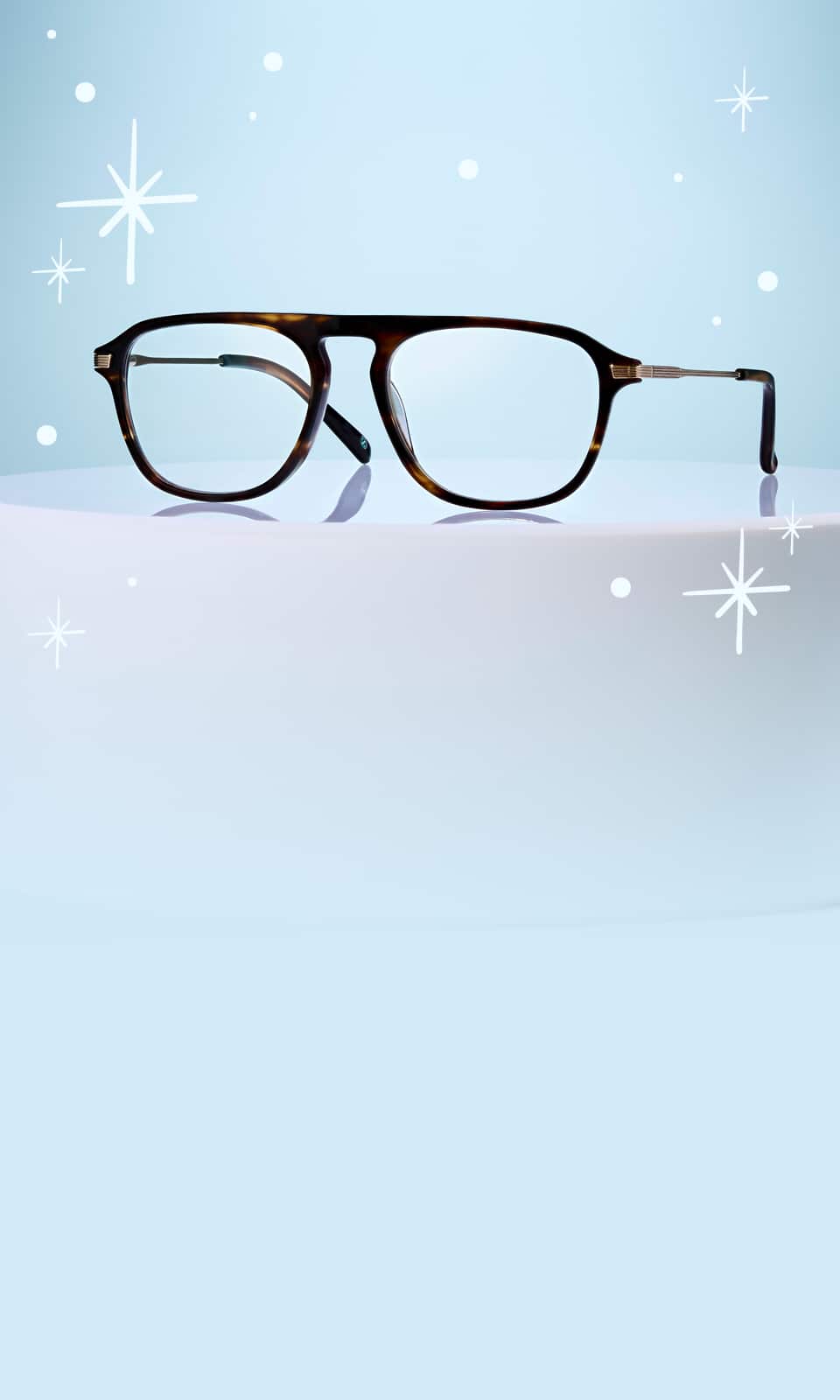 Aviator glasses resting on a white pedestal, on a light blue background with an illustrated sparkle motif.