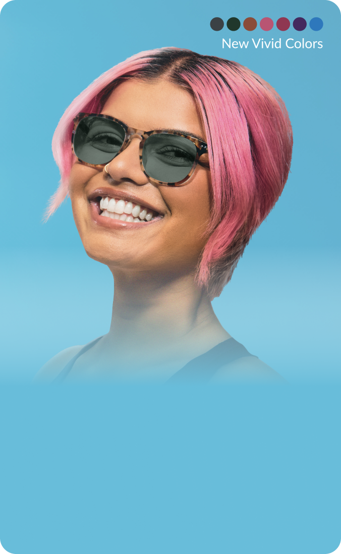 Smiling person with pink hair wearing purple-tinted sunglasses against a blue background. There is a row of color swatches labeled 'New Vivid Colors.