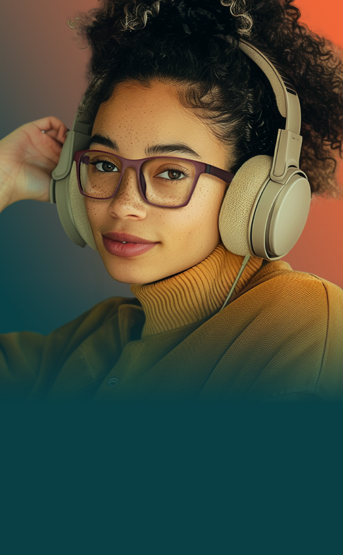 A man wearing headphones and Optiflex aviator glasses that fit comfortably underneath the headphones.