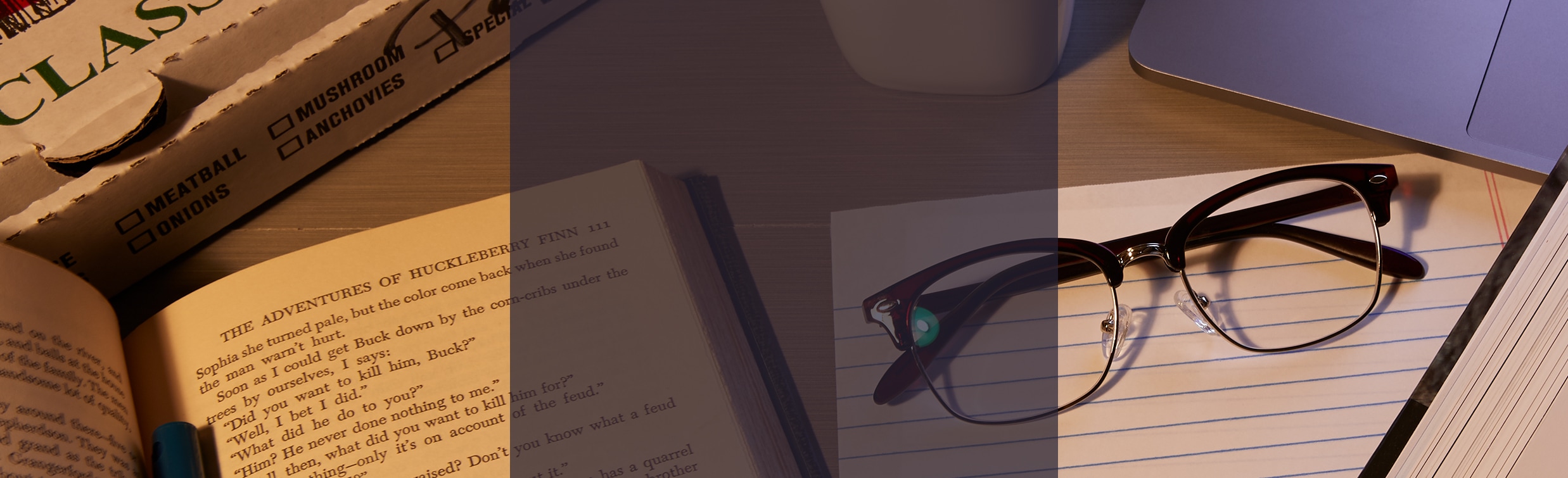 Classic browline glasses #194815 in brown on top of a notepad surrounded by books and a coffee mug. 