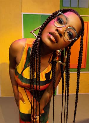 Keke Palmer in trending oversize glasses, from her “Summer Love” collection, part of the Keke Palmer x Zenni frame collaboration.