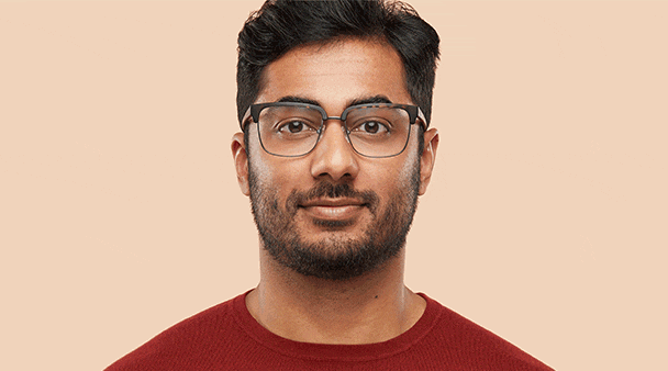 Virtual Try-On image of man with beard wearing browline glasses.