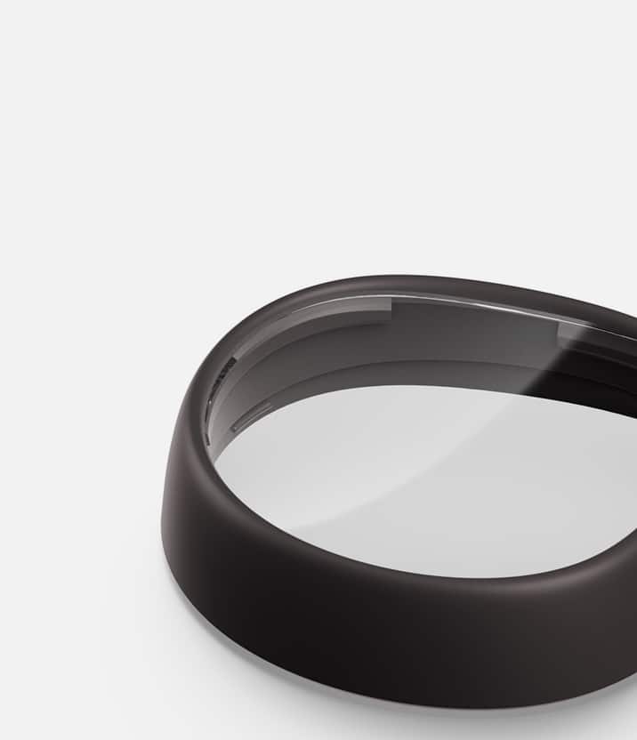 Close-up of a Zenni VR lens insert with anti-reflective coating, emphasizing glare-free visual sharpness.