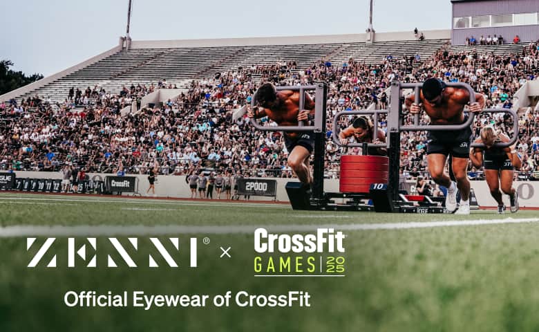 Athletes compete in a weight sled push event at a packed stadium during the CrossFit Games, with Zenni shown as the official eyewear sponsor.
