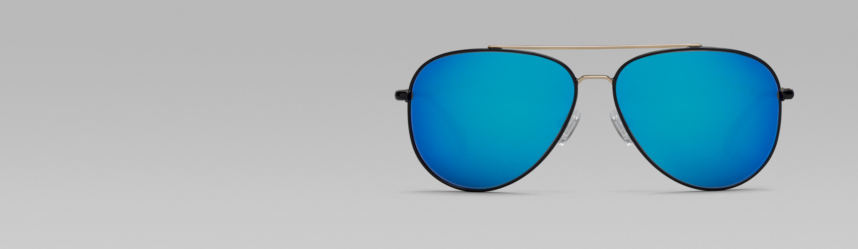 Rotating image of Zenni Premium Aviator Sunglasses #1126721 in black with tinted lens (yellow and lavender tint) and mirror coating options (indigo blue, moss green, and lavender mirror).